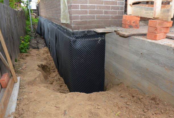 Happy homeowners after waterproofing job in Minnetonka
